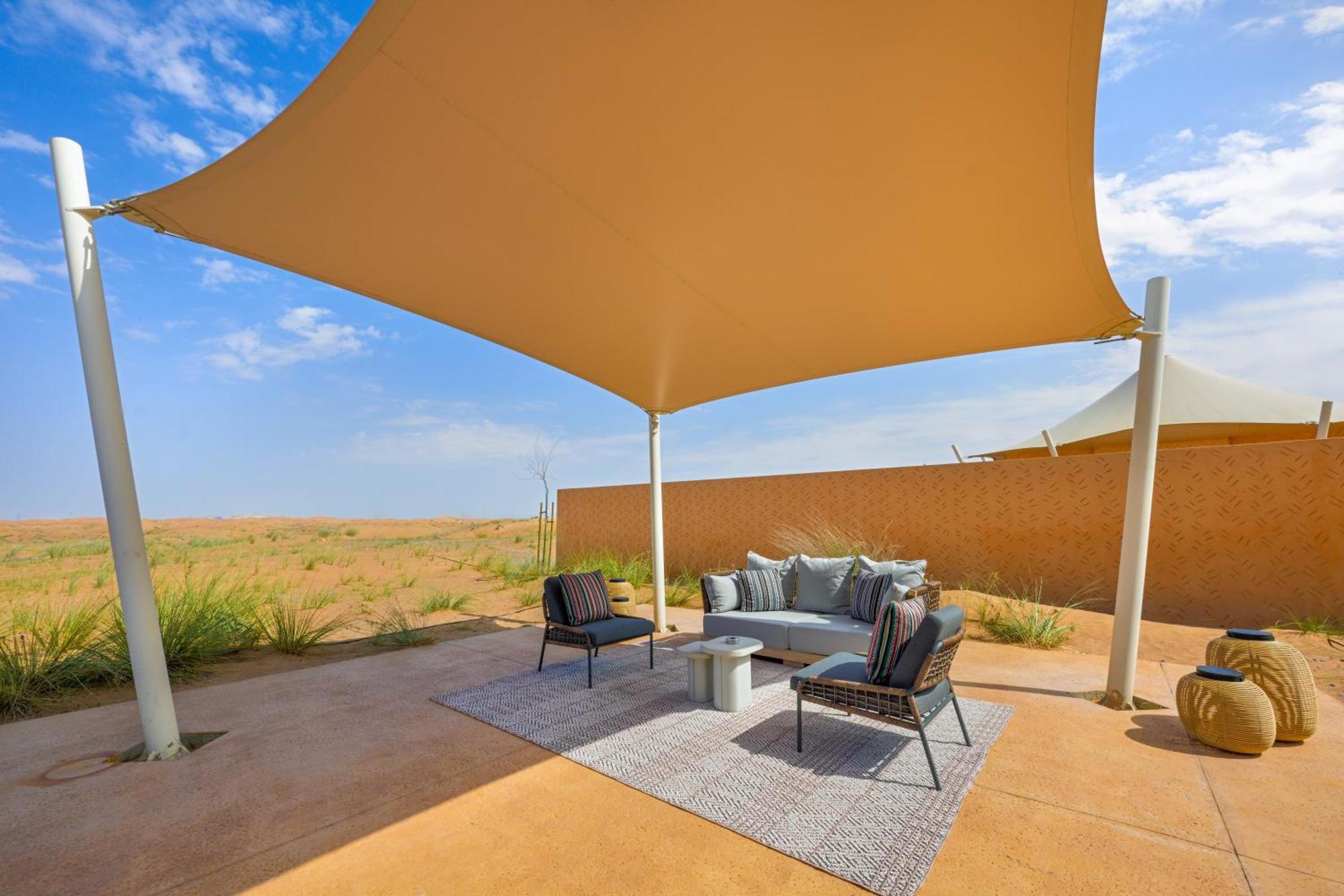 Hotel Al Badayer Retreat By Sharjah Collection Margham Exterior foto A shade sail at the Al Maha Desert Resort, Dubai