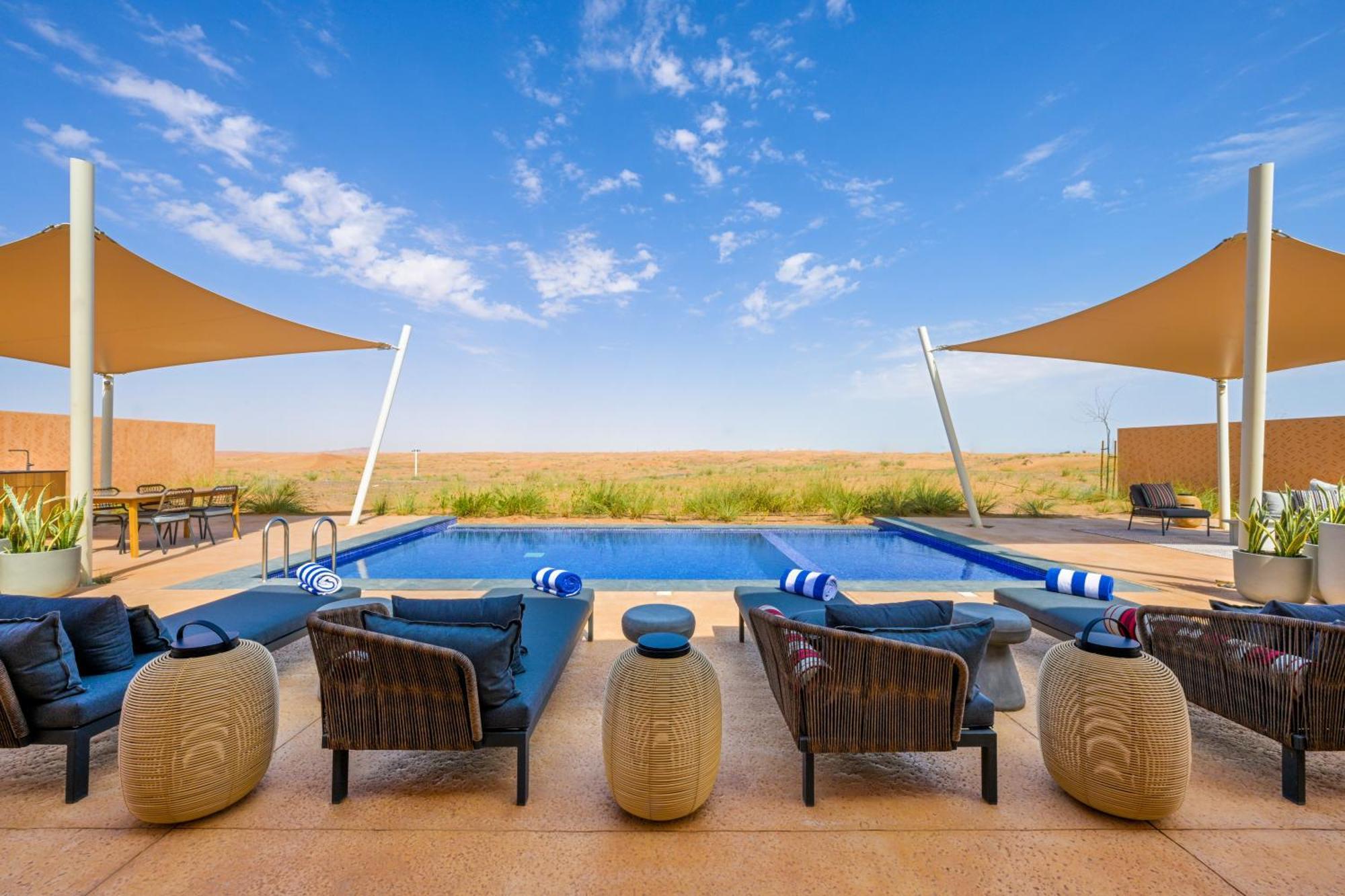 Hotel Al Badayer Retreat By Sharjah Collection Margham Exterior foto The pool at the Al Maha Desert Resort